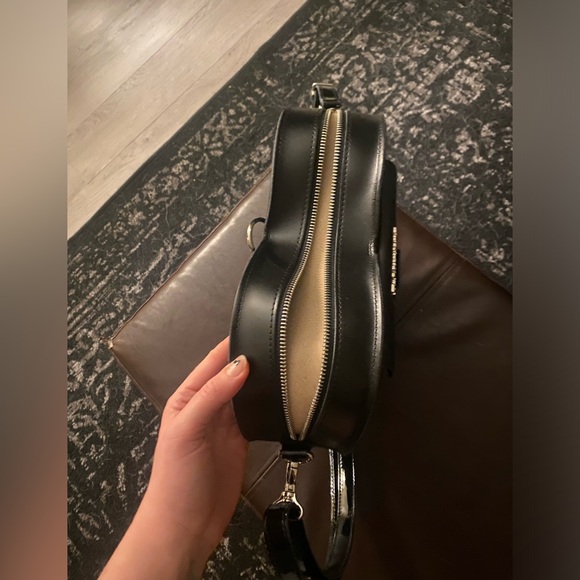 Heart shaped bag/back pack. It’s really sturdy and brand new. - Picture 6 of 6